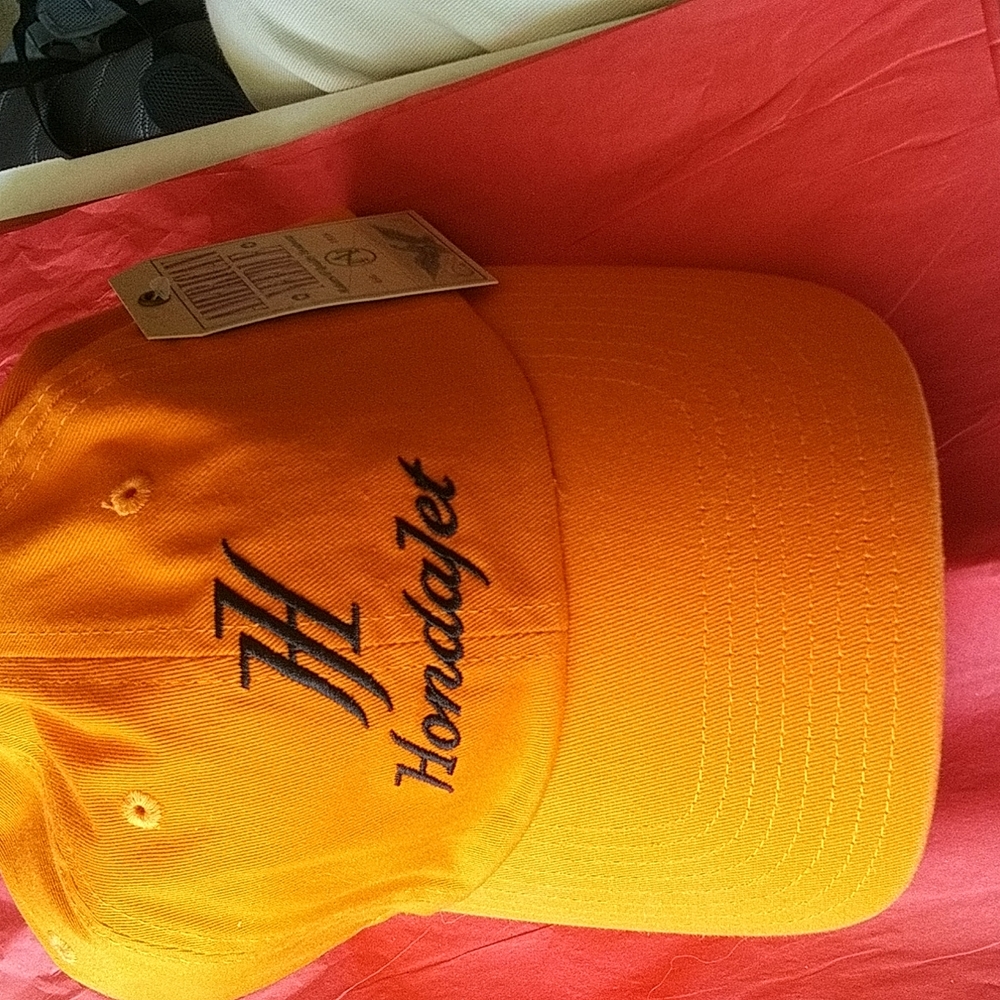 Honda Honajet 1 size nowt $34. + free hat. Item (i